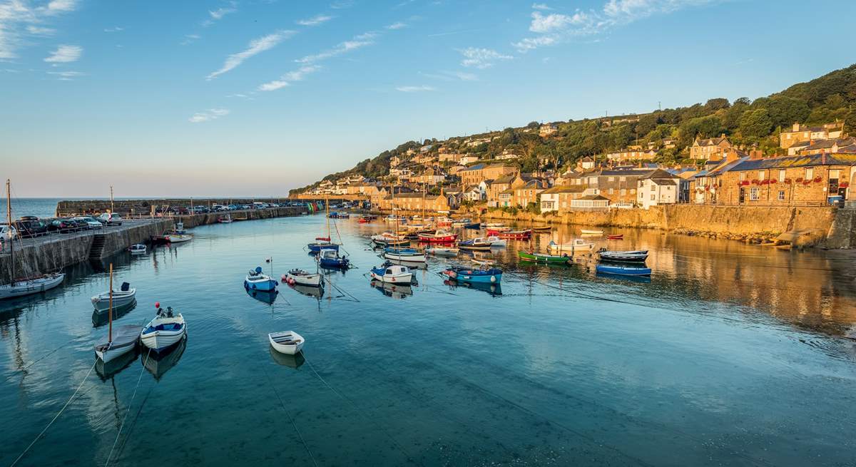 The picturesque fishing village of Mousehole is only a short drive away.