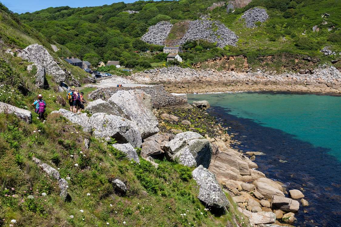 Lamorna Cove is a beautiful secluded pebble beach accessible by car or via the South West Coast Path.