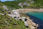 Lamorna Cove is a beautiful secluded pebble beach accessible by car or via the South West Coast Path.