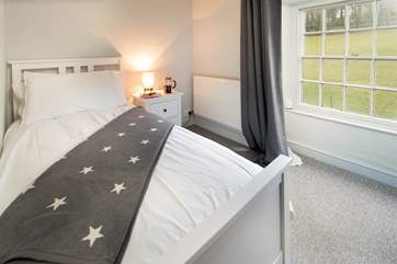 The lovely single room, with views over the hills and meadows, is to the front of the farmhouse.