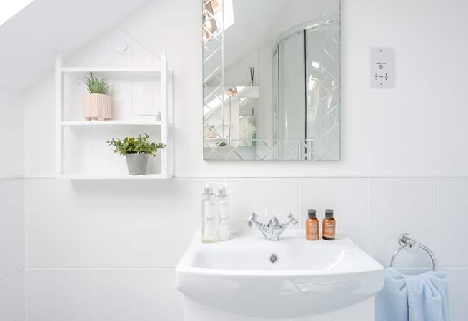 The shower room sits just outside both bedrooms.