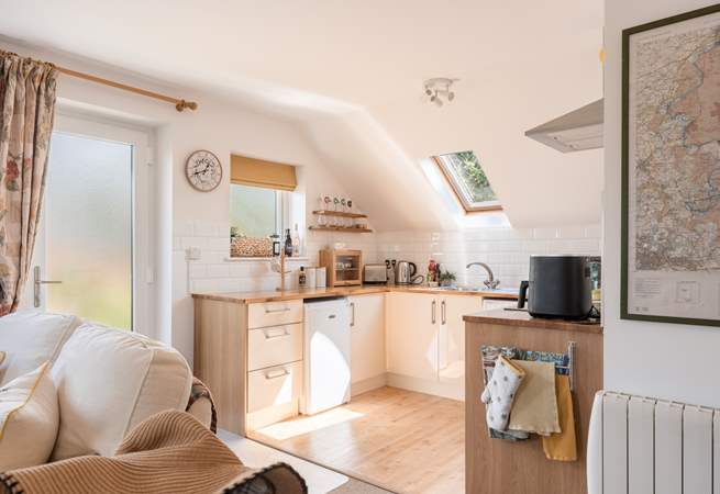 The kitchen is fully equipped and ready for the chef. 