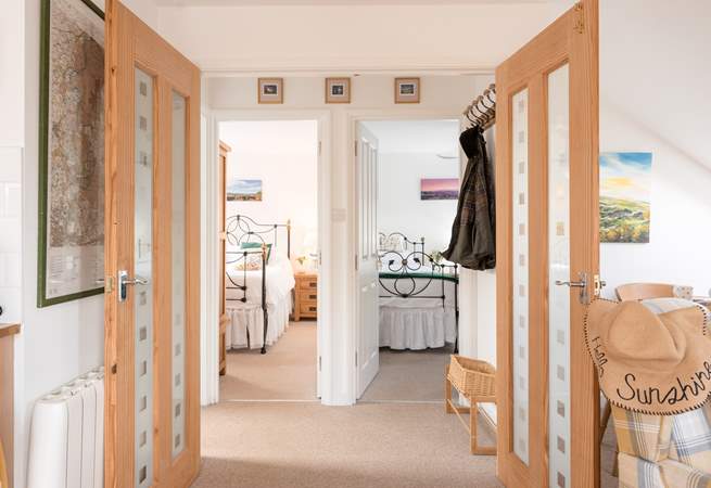 Head through the doors to find both bedroom and the shower room.