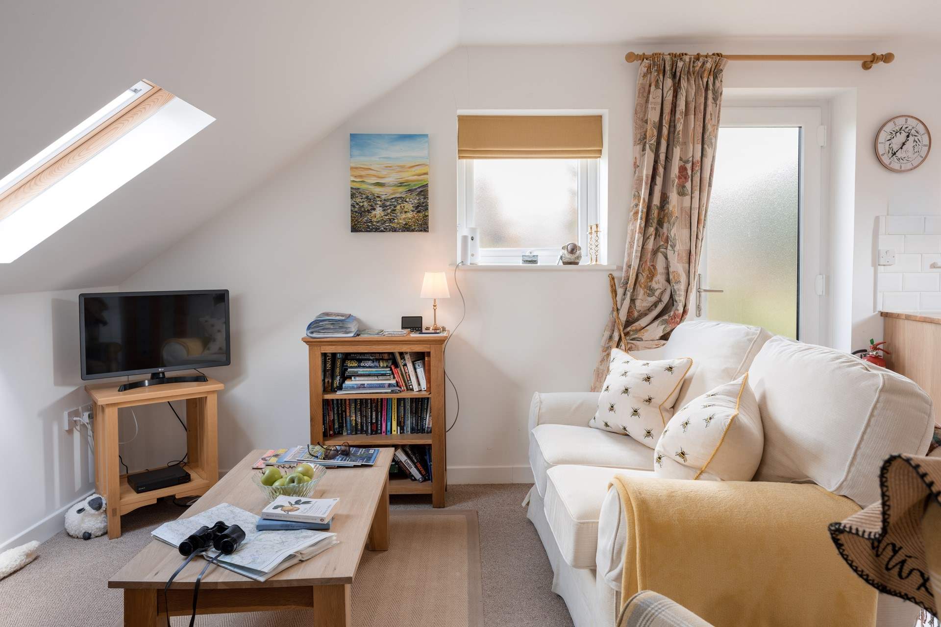After a full day out you can relax into a the comfortable sofa and switch the TV on.