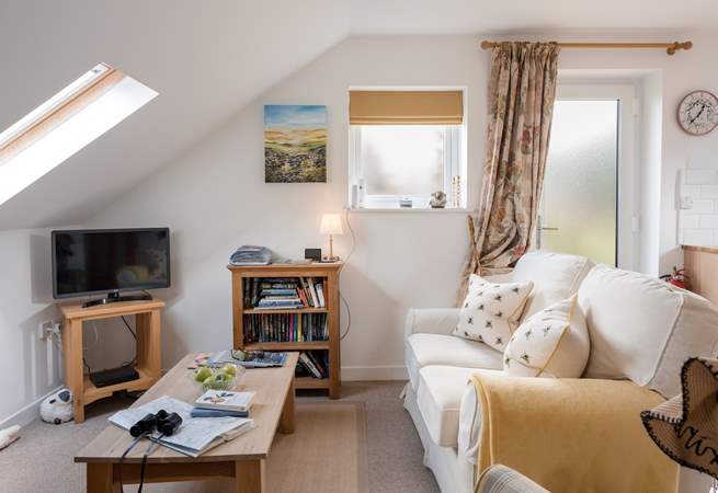 After a full day out you can relax into a the comfortable sofa and switch the TV on.