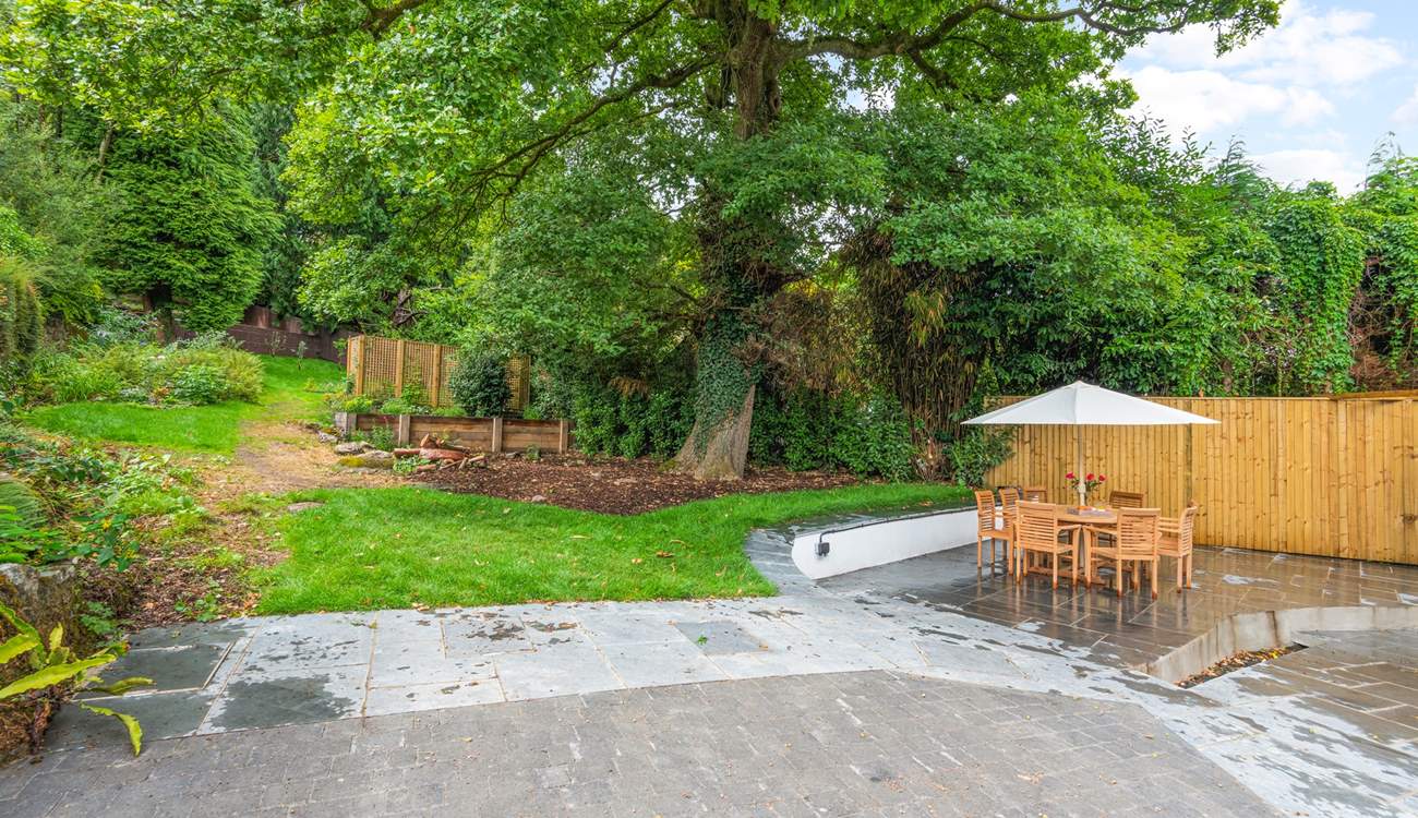 Oodles of space in the garden and terrace area. Please be aware of the steps and small stream which runs through the paved area (which is covered by a grate for safety).