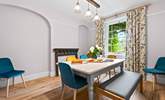 The dining-room is a lovely, light space. - Thumbnail Image