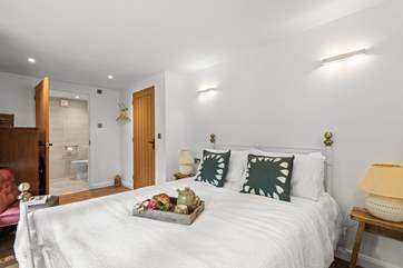 Bedroom two is a pretty double with en suite shower-room.