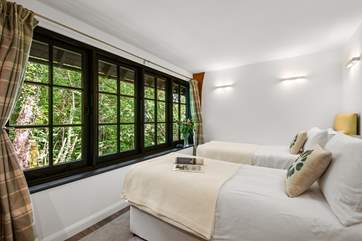 Bedroom one has a delightful outlook.