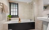 This gorgeous bathroom is the en suite to bedroom one. - Thumbnail Image