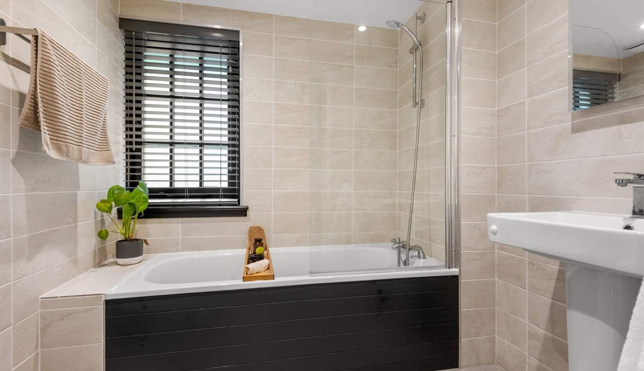 This gorgeous bathroom is the en suite to bedroom one.