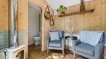 A cosy wood-burner will keep you warm in cooler months.