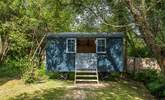 This delightful shepherd's hut is home to bedroom 4. - Thumbnail Image