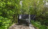 This fabulous wood-fired hot tub sits amongst tranquil woodland. - Thumbnail Image