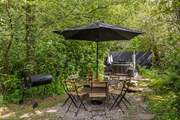 Outdoor living at its best. Please note there is a trickling steam running through the garden and if there is water flowing there are stepping stones to reach the hot tub.