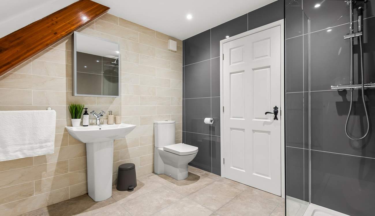 The super en suite has a fabulous walk-in shower.