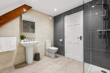 The super en suite has a fabulous walk-in shower.