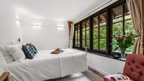 Four fabulous bedrooms await, three in the cottage and the fourth in the cute shepherd's hut. This is delightful bedroom two.
