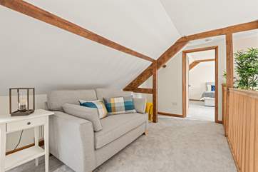 The first floor landing is a lovely place to relax with a good book.