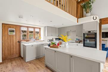 The gorgeous kitchen is a lovely spot to cook up a feast.