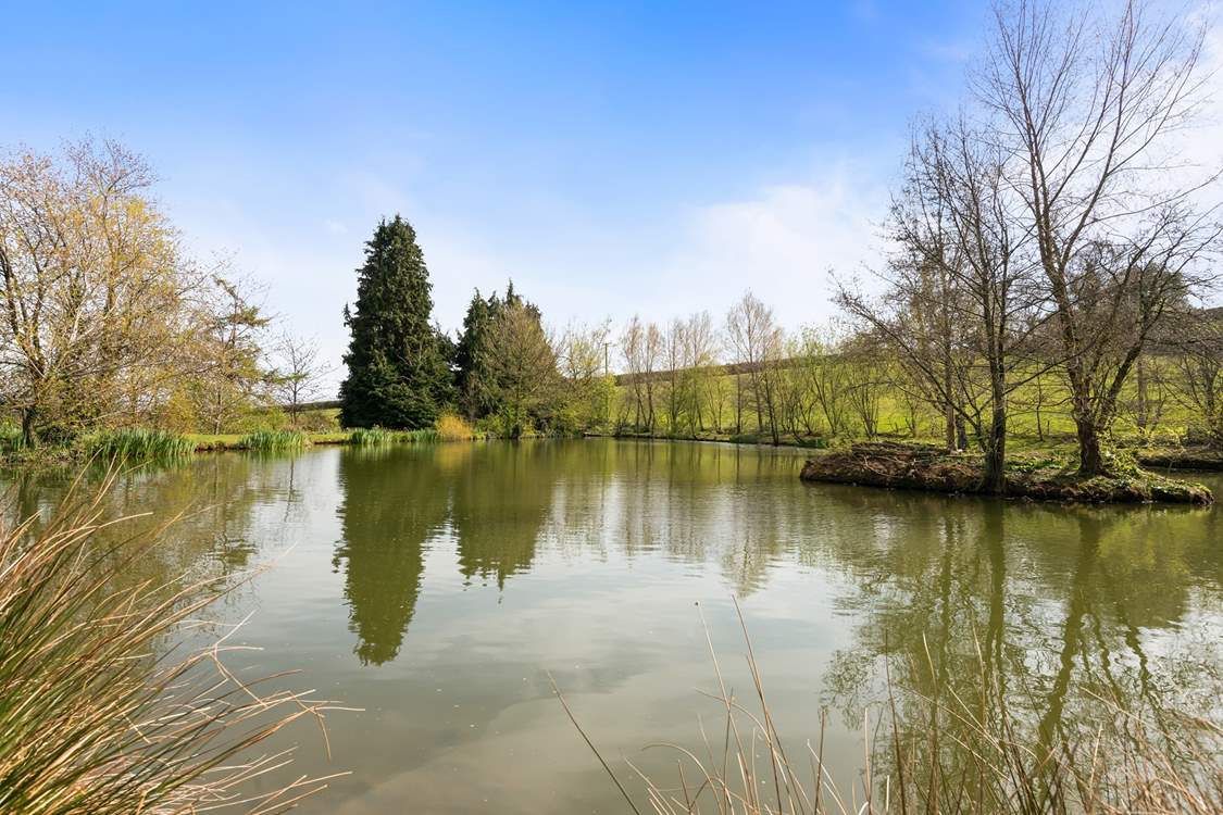 Enjoy a spot of fishing at the pretty lake.