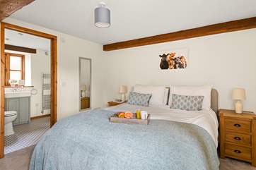 Bedroom 1 has a sumptuous king-size bed.