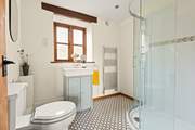 The stylish en suite to Bedroom 1.