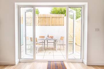 Venture outside to the marvellous outside dining-area and up the steps is the hot tub!