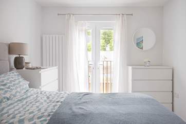 Wake to the morning sun creeping in through the splendid double doors.