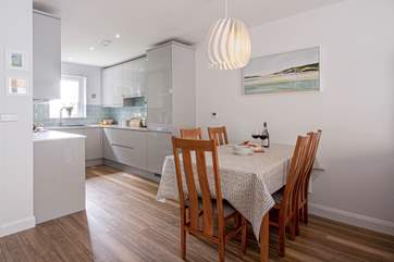 Crisp natural light floods in from one of the many windows dotted around the house.
