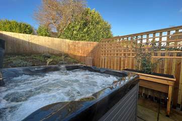 Enjoy sunny afternoons in the hot tub.