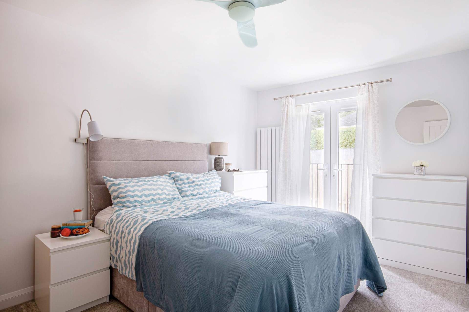 The main bedroom looks out over the back of the garden. 