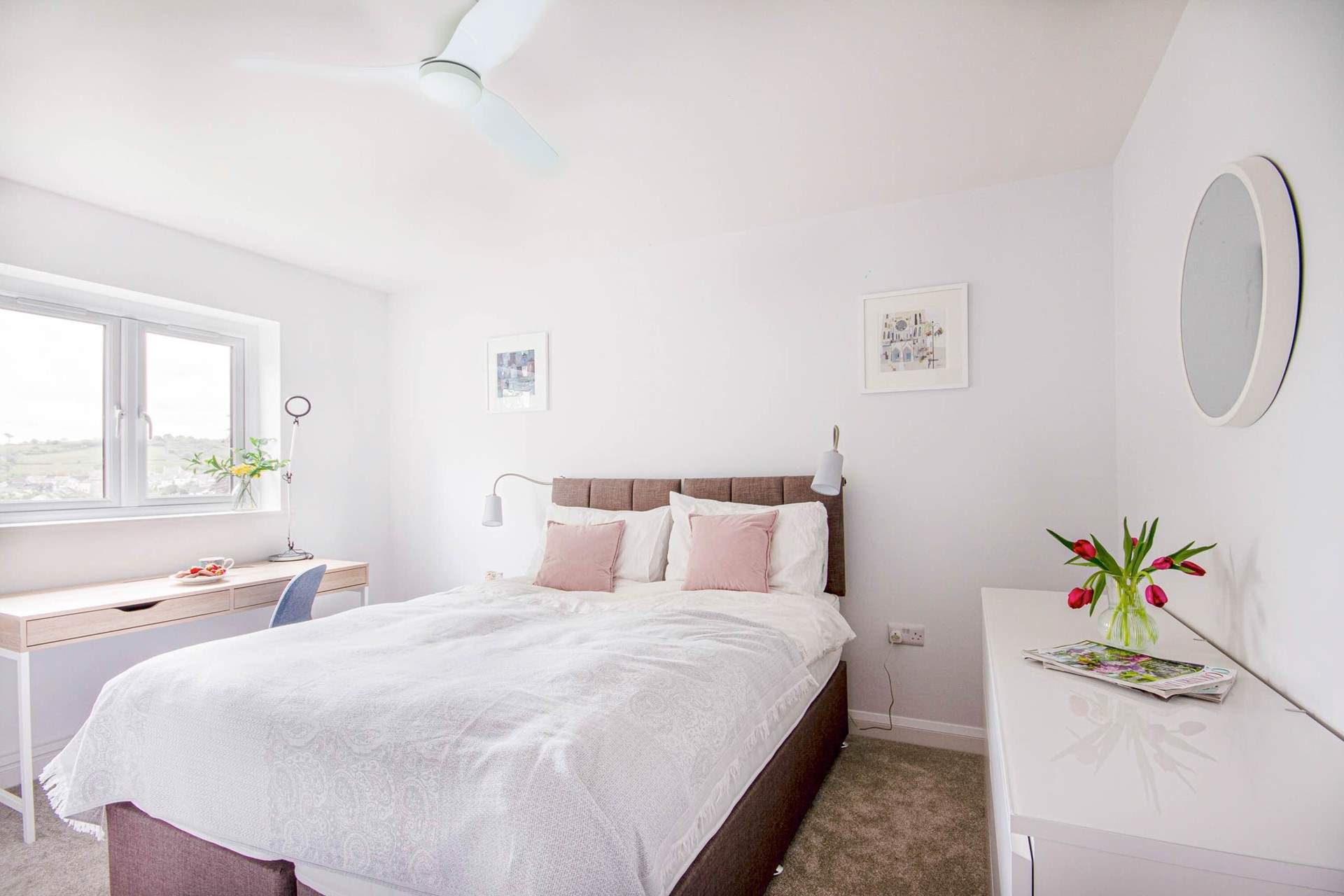 This bedroom has far reaching views at the front of the house. 