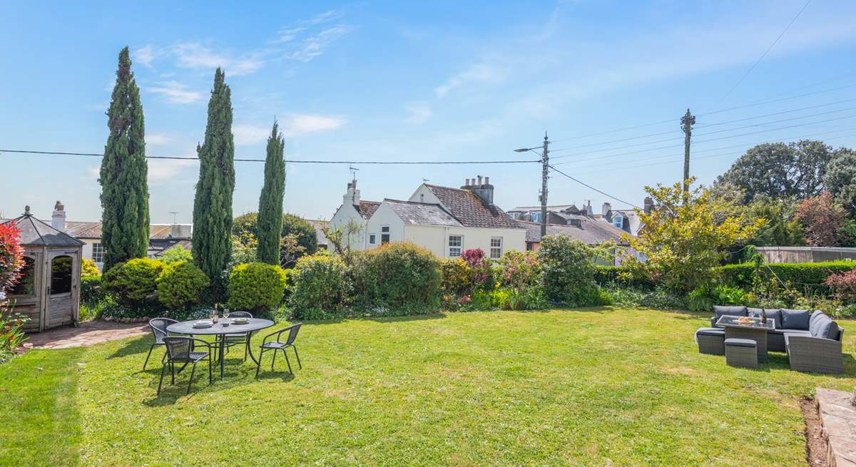 Take in the glorious Devonshire sunshine in the large garden area.