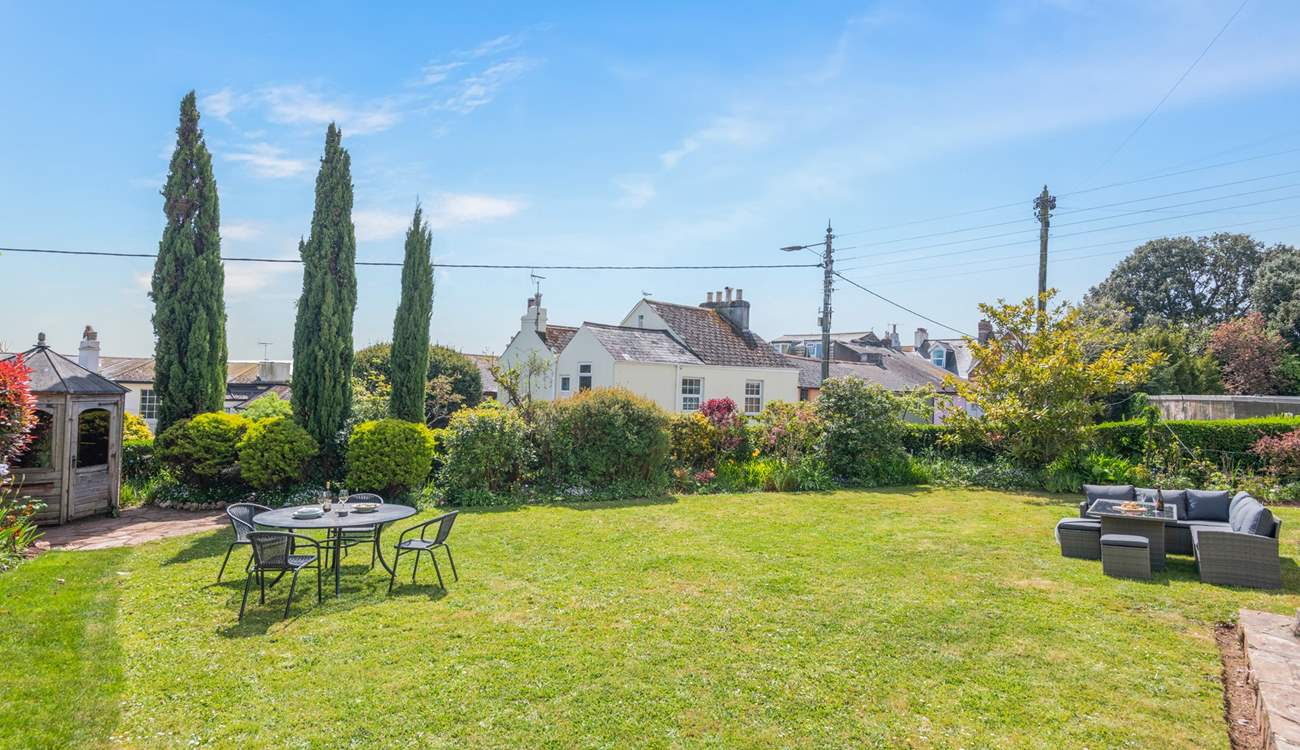 Take in the glorious Devonshire sunshine in the large garden area.