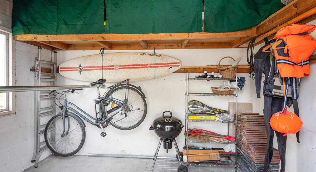 The outside shed is perfect for storing wetsuits, paddle boards, and bicycles.