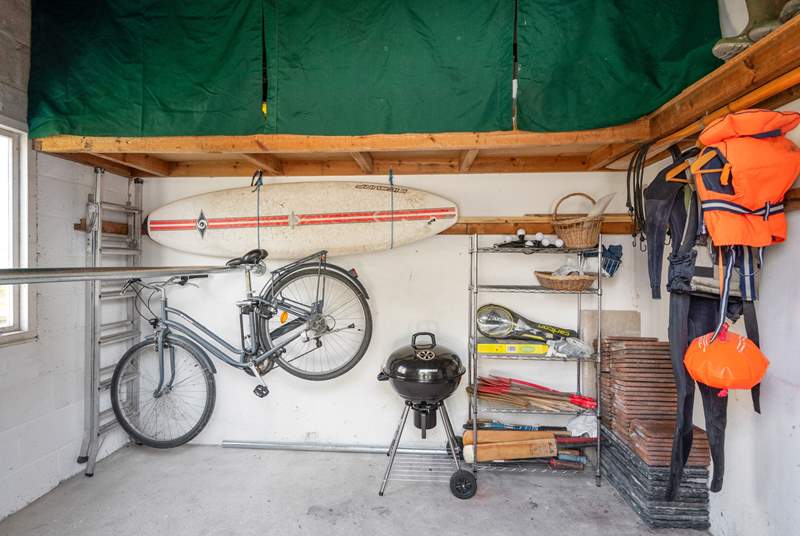 The outside shed is perfect for storing wetsuits, paddle boards, and bicycles.