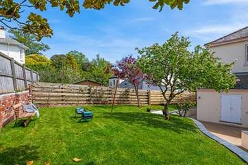 There is also a more private garden behind the house.
