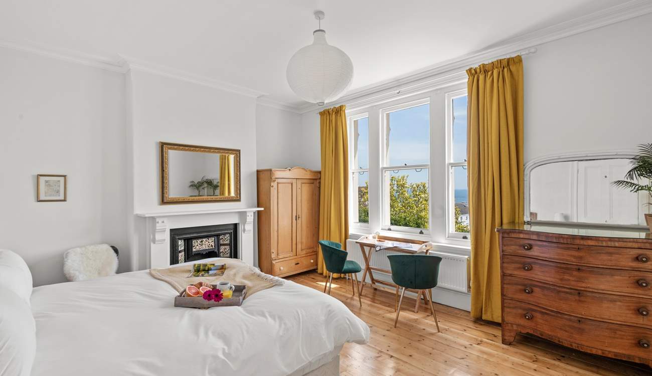 Wake to the crisp morning sun peeking through the curtains in bedroom five.