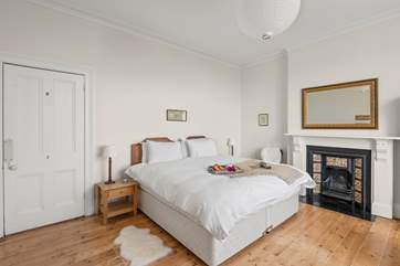 Relax after a big day in bedroom five.