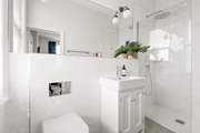 Bedroom four also comes equipped with a crisp en suite.