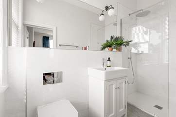 Bedroom four also comes equipped with a crisp en suite.