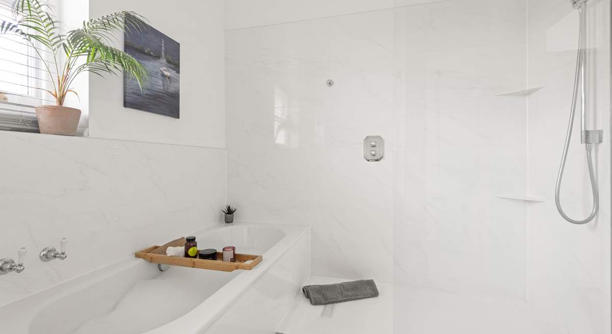 Unwind after a long day in the inviting bath and shower.