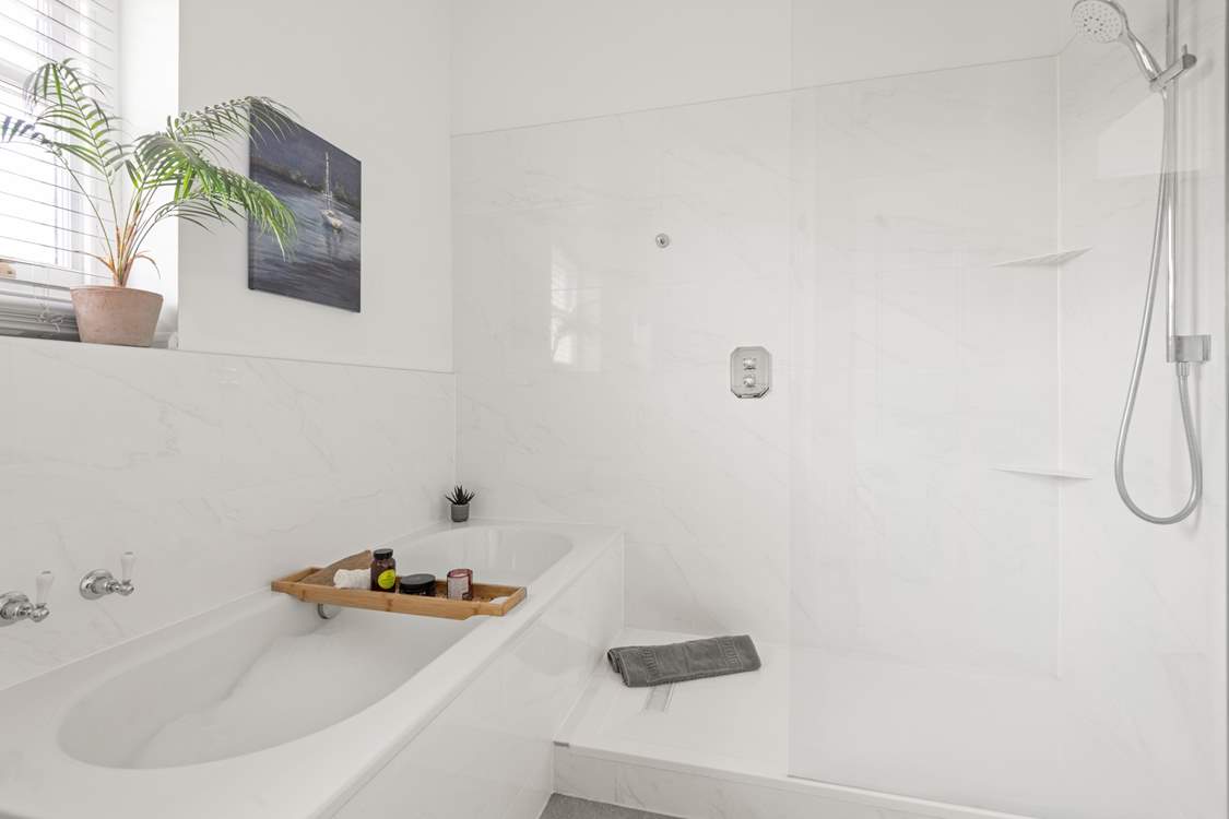 Unwind after a long day in the inviting bath and shower.
