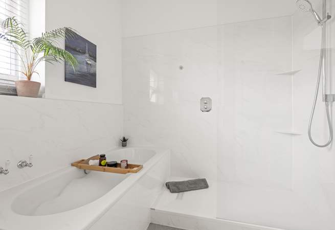 Unwind after a long day in the inviting bath and shower.