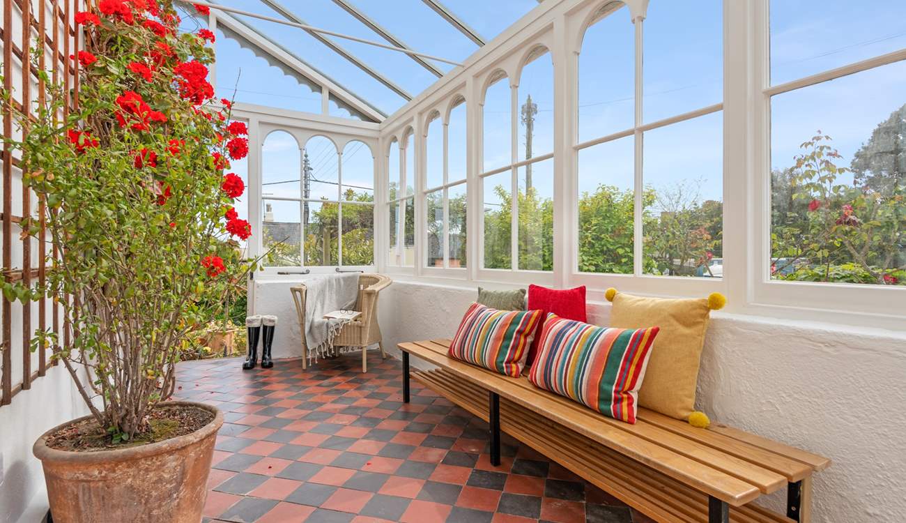 Enter through the marvellous conservatory. 