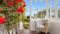 Wander through the conservatory into the beautiful garden.