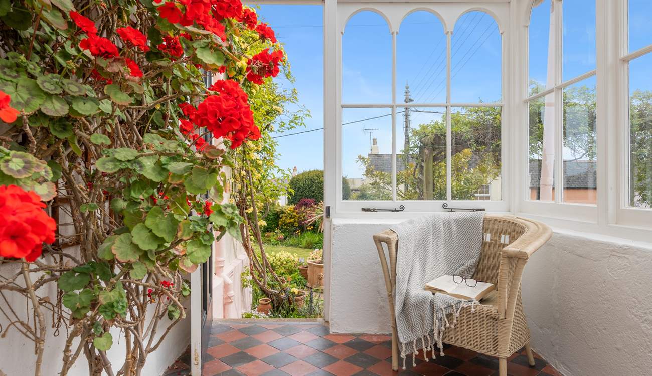 Wander through the conservatory into the beautiful garden.