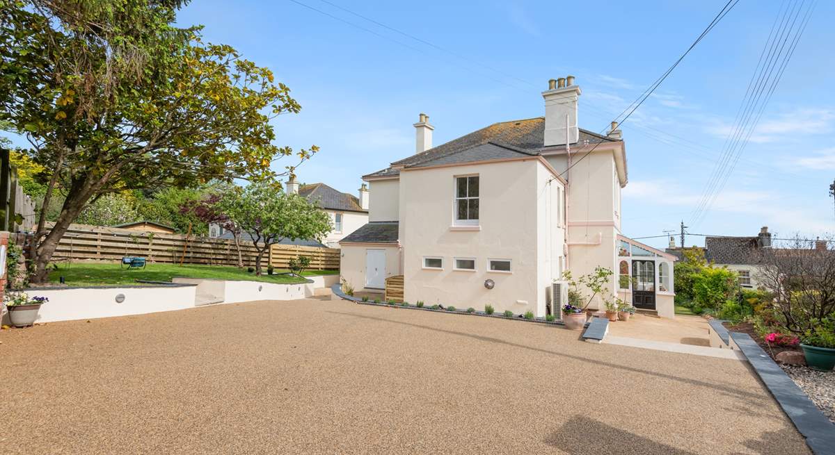 There is ample parking for three cars outside the house. 