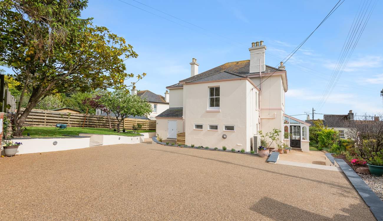 There is ample parking for three cars outside the house. 